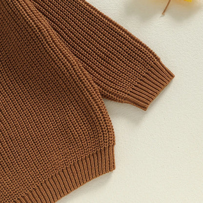 Pull tricoté brodé pour bébé