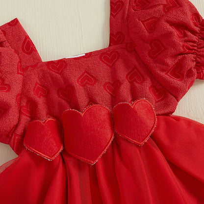 Robe barboteuse à manches courtes bouffantes, col carré avec bandeau à nœud